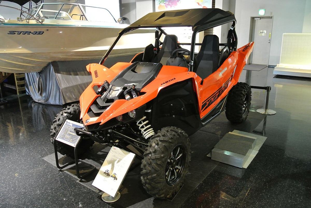 A Yamaha YXZ1000R side-by-side utility vehicle on display